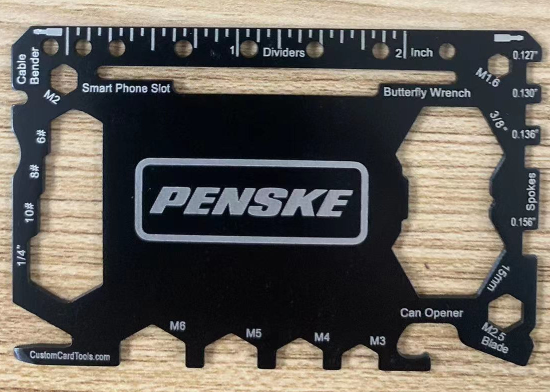 Promotional Multi-tool card with multiple functions on a wooden surface